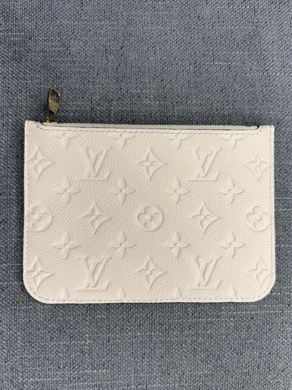 Louis Vuitton Loop monogram empreinte Cream pouch